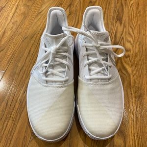 White adidas athletic shoes